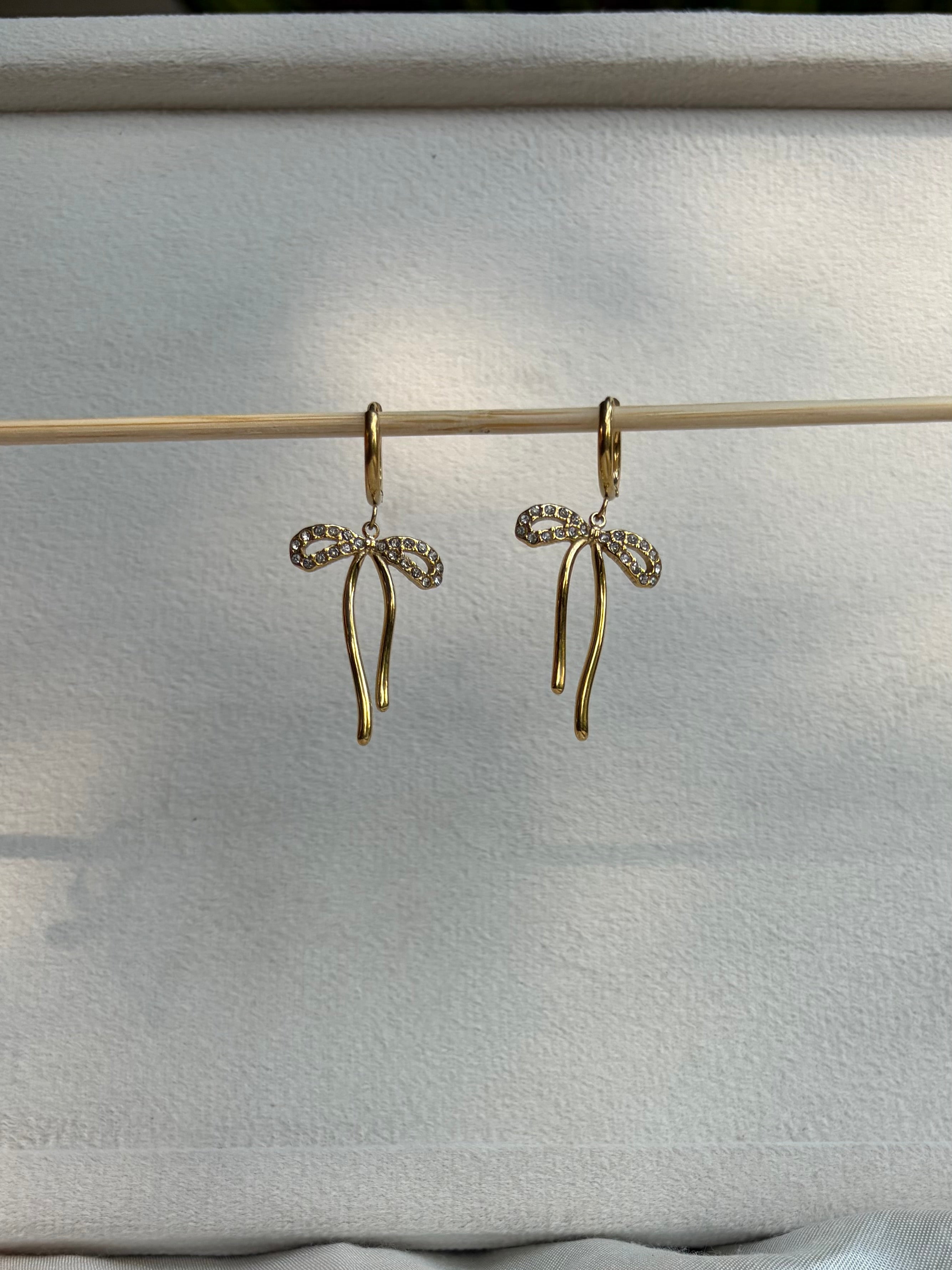 Crystal Bow Drop Huggie Earrings