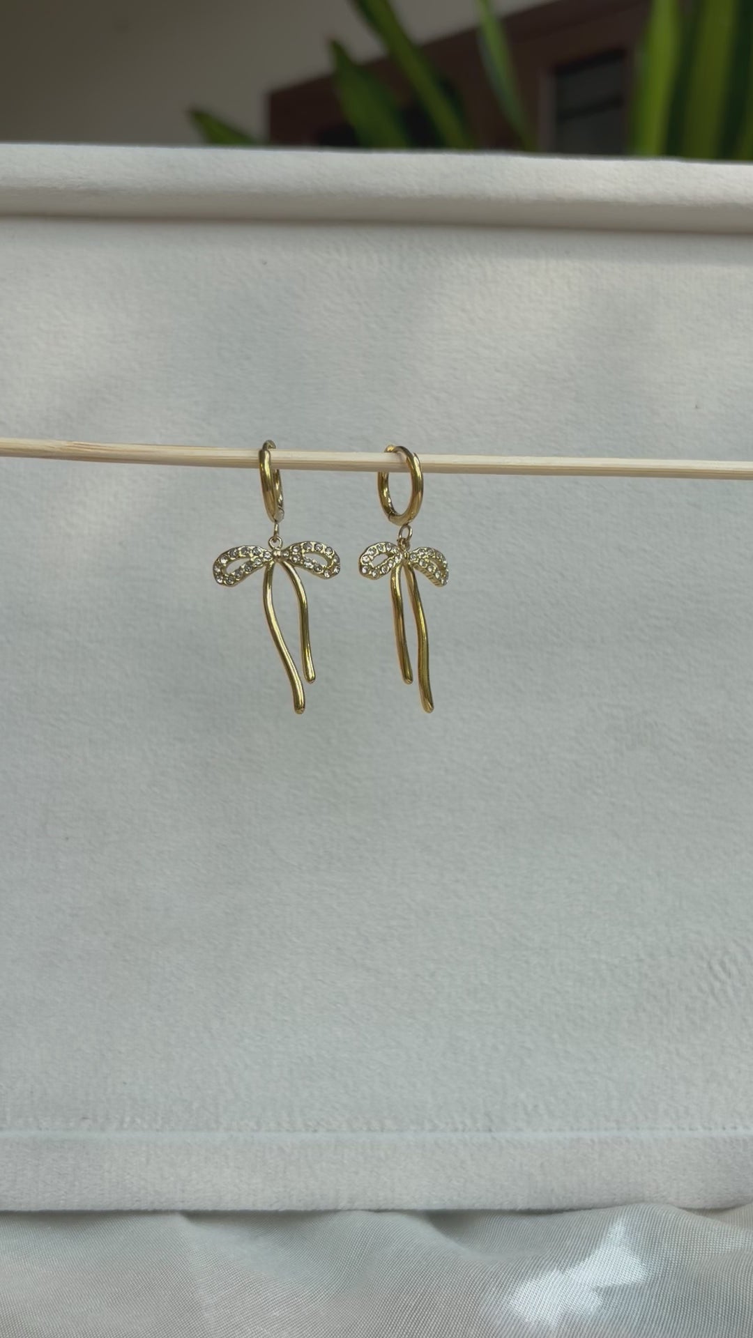 Crystal Bow Drop Huggie Earrings